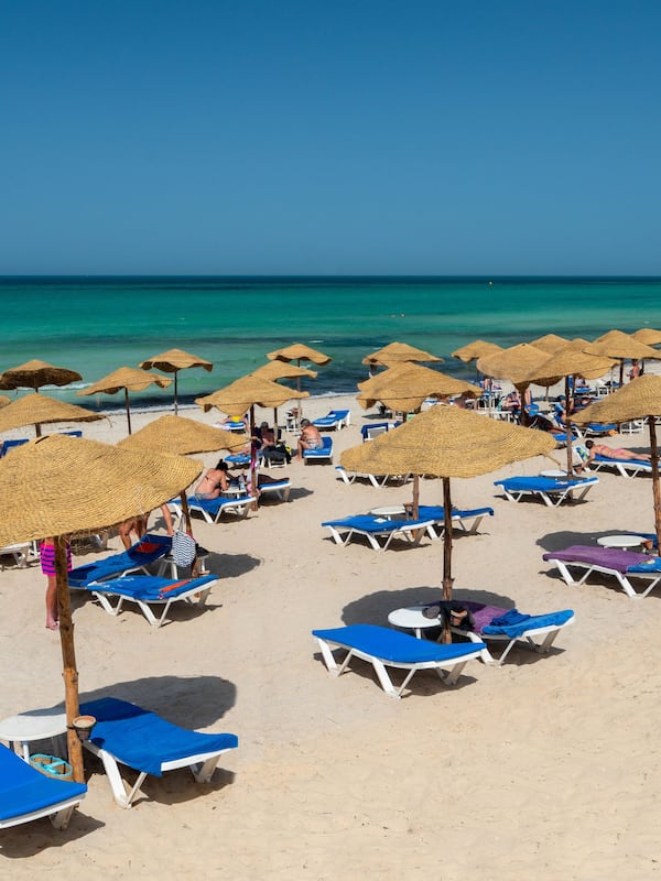 Private beach, white sand, sun loungers, beach umbrellas
