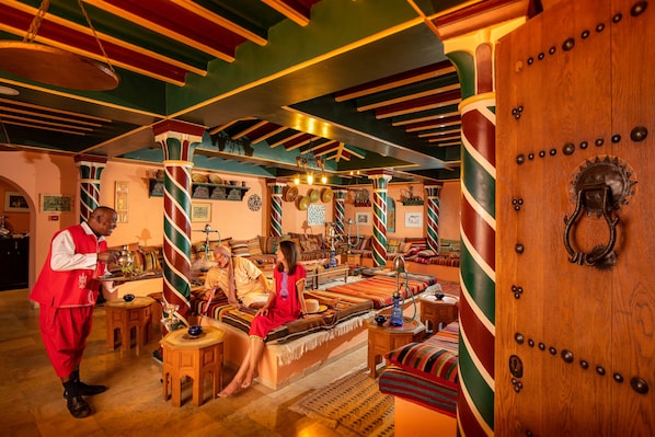 3 bars/lounges, poolside bar, beach bar