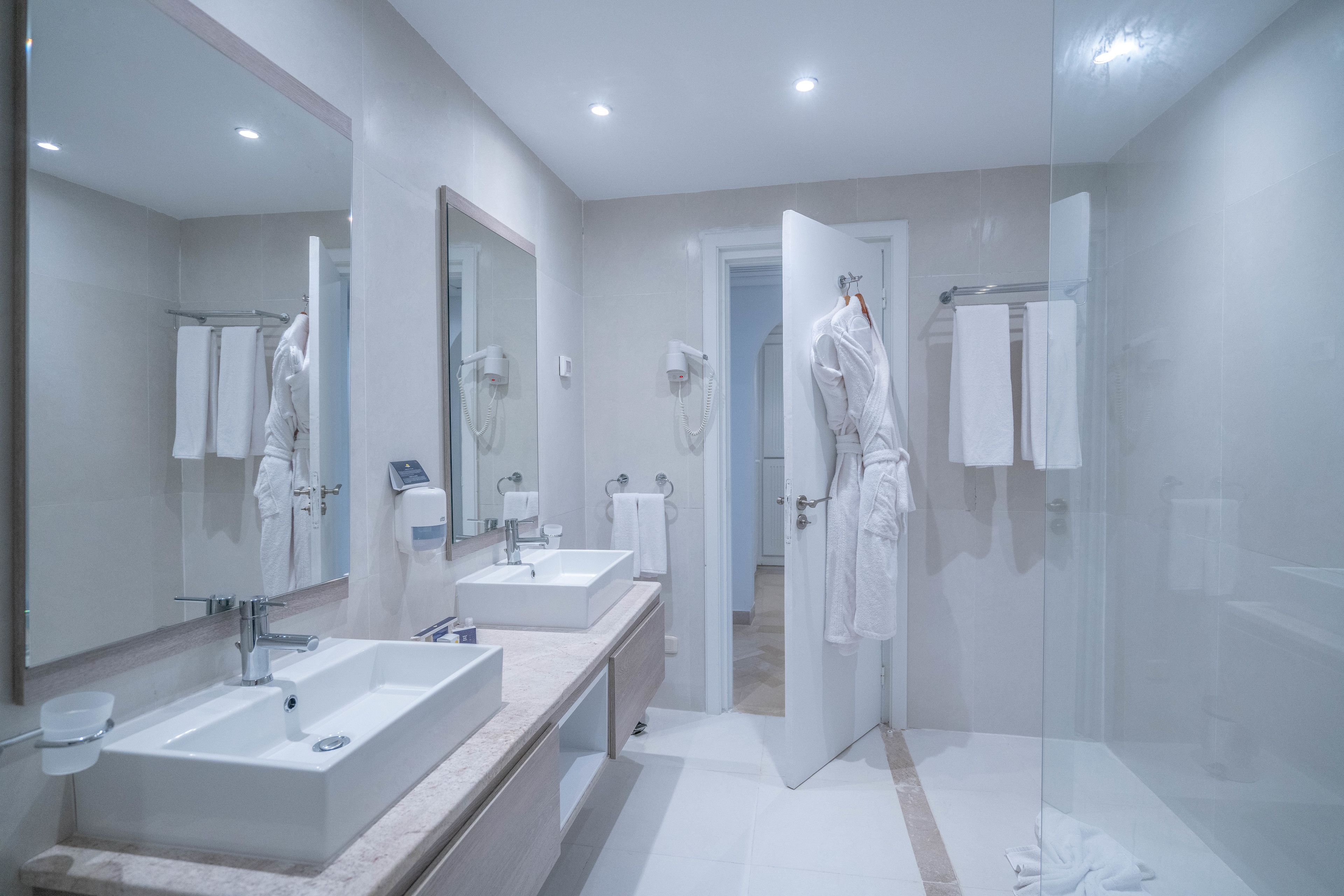 deep-soaking bathtub, free toiletries, hair dryer, bathrobes