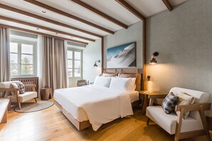 Select Comfort beds, minibar, in-room safe, desk