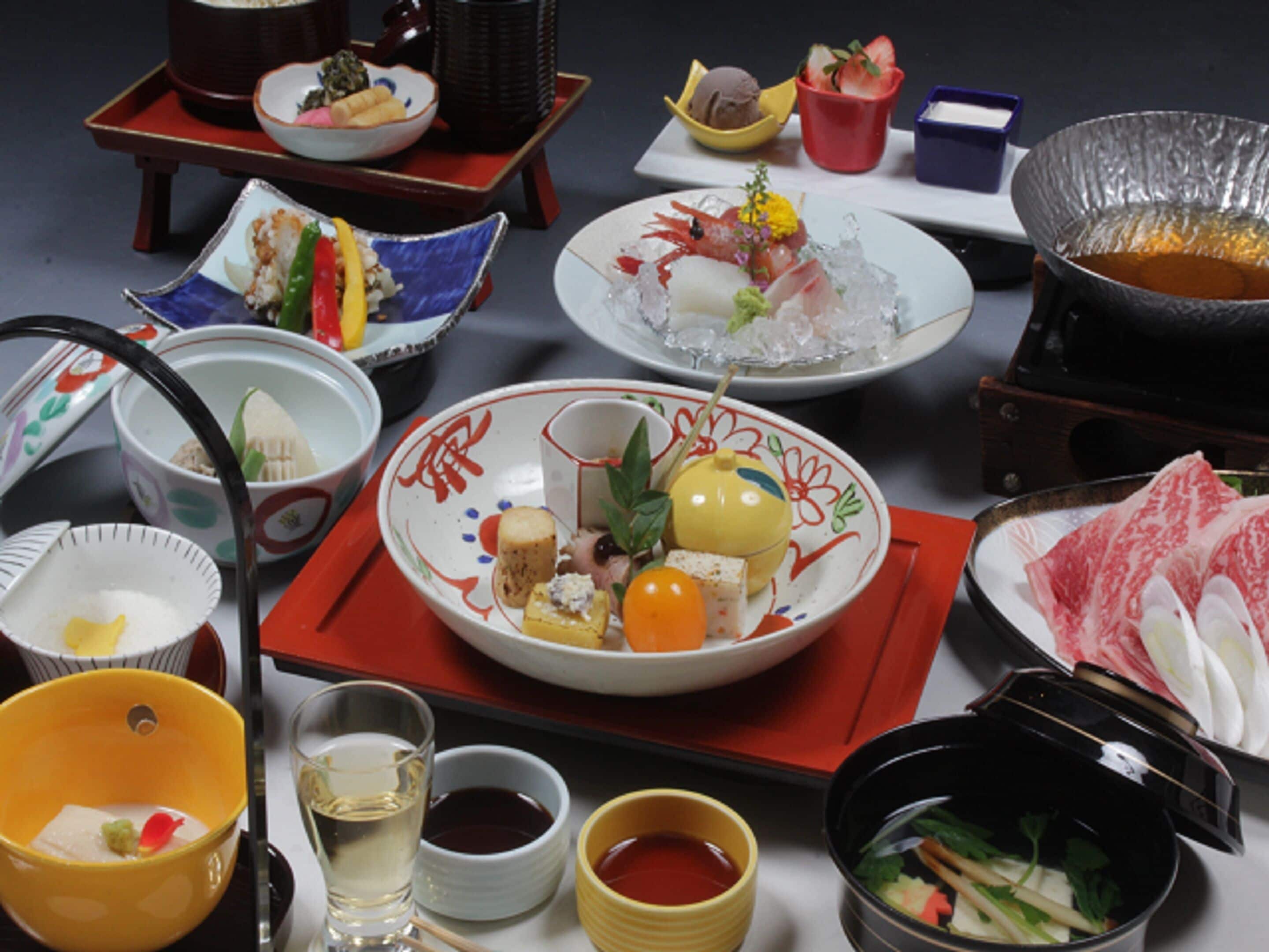 A variety of dishes and bowls on a table, suggesting a meal setting.