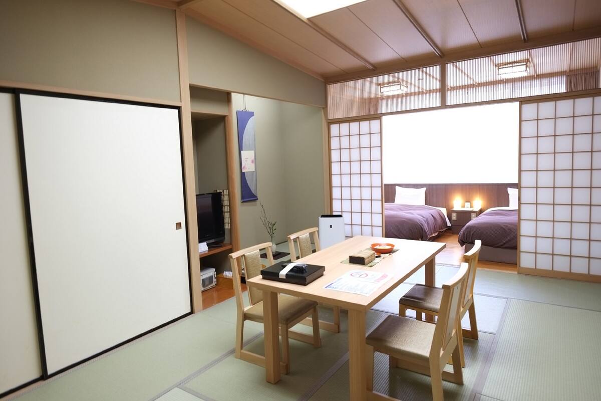 room with tatami area | 1 bedroom, in-room safe, bed sheets