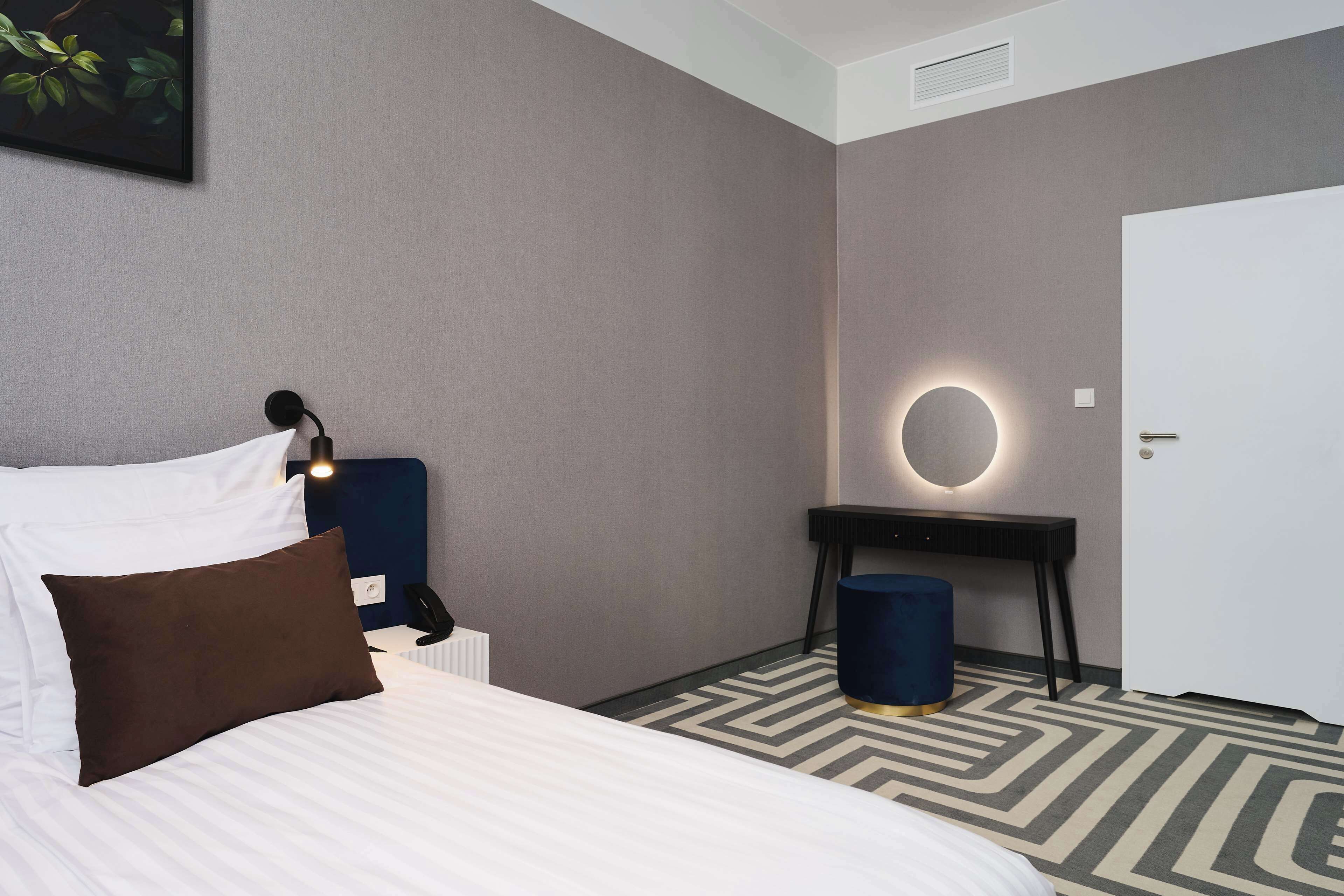 suite, 1 king bed, non smoking, city view | 1 bedroom, desk, iron/ironing board, free wifi