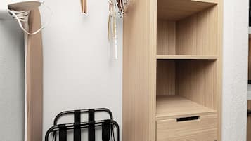 Desk, laptop workspace, blackout drapes, iron/ironing board