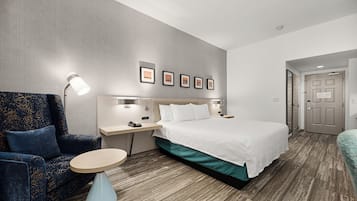 Desk, laptop workspace, blackout drapes, iron/ironing board