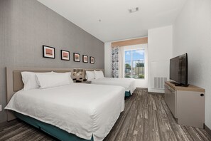 Combined shower/bathtub, designer toiletries, hair dryer, towels