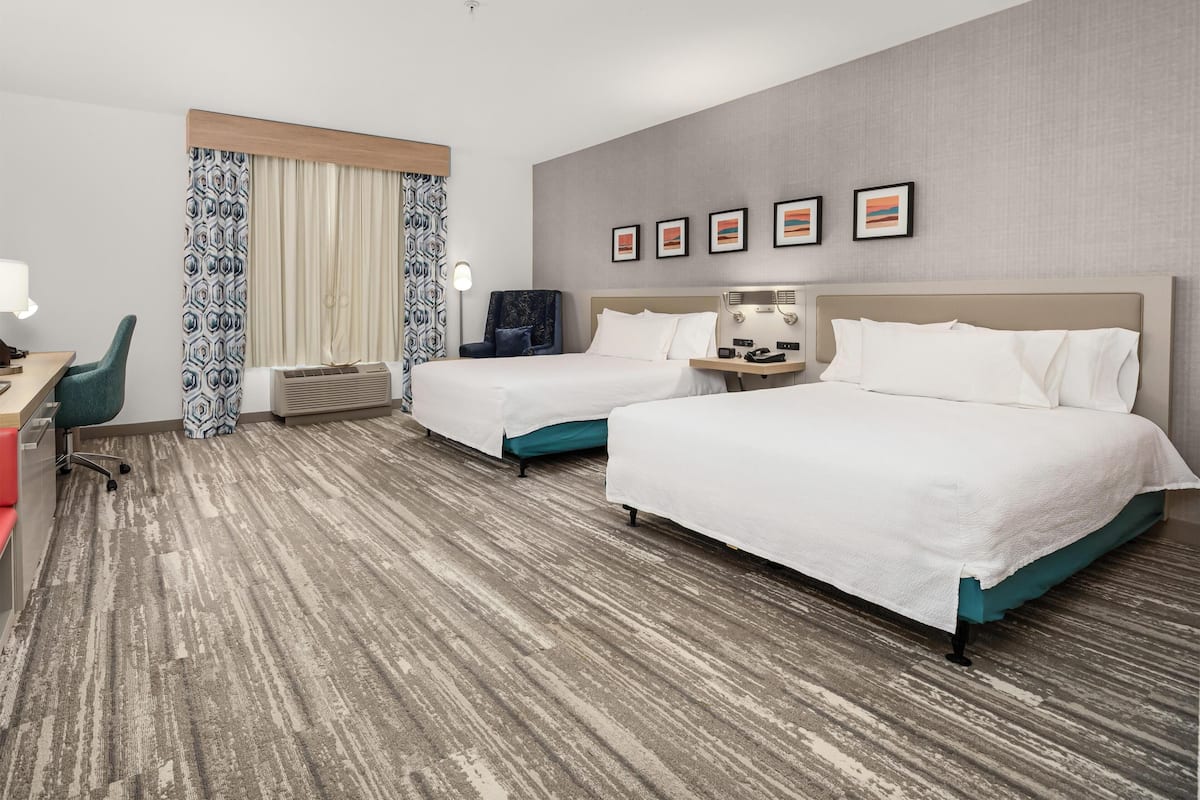 Desk, laptop workspace, blackout drapes, iron/ironing board