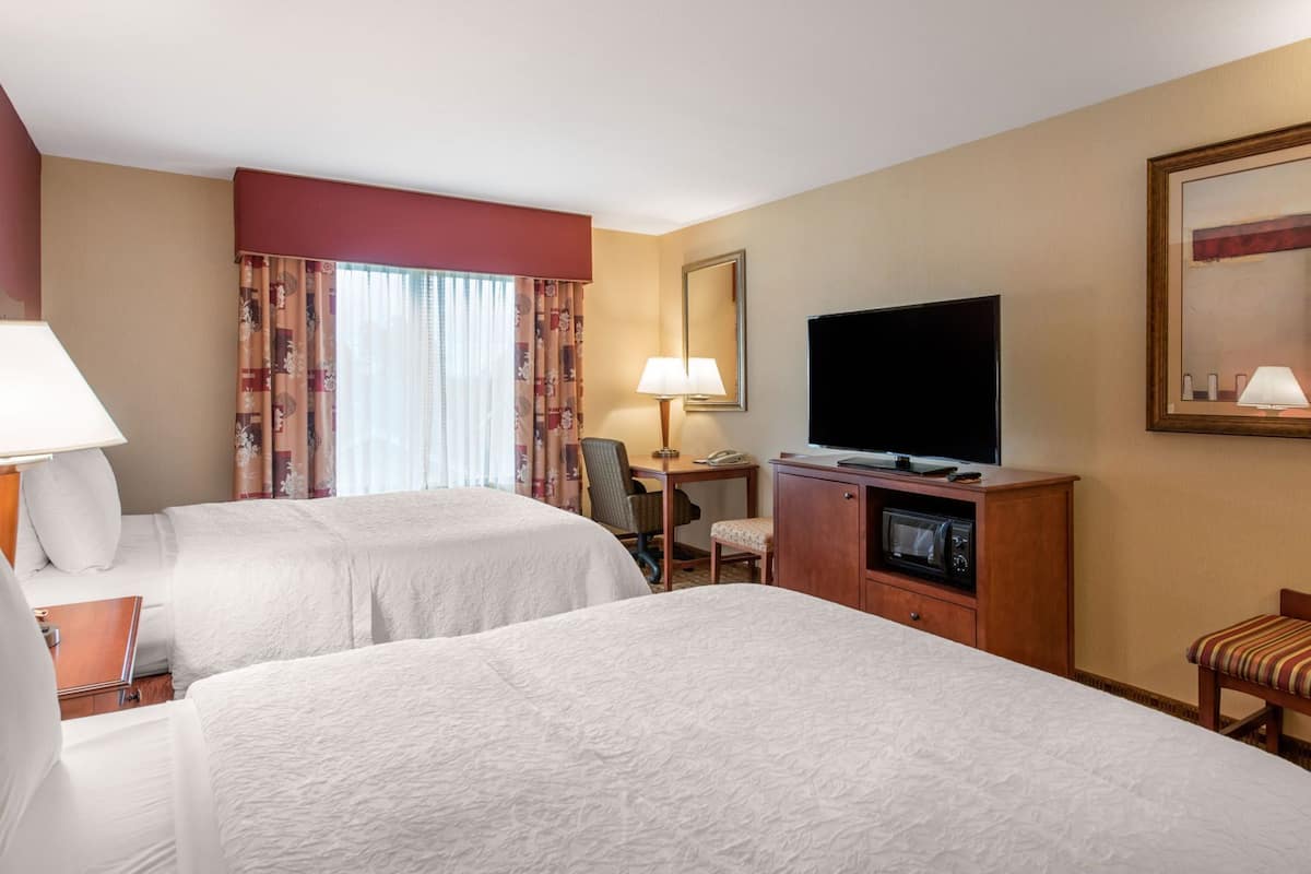 Premium bedding, down comforters, pillowtop beds, in-room safe