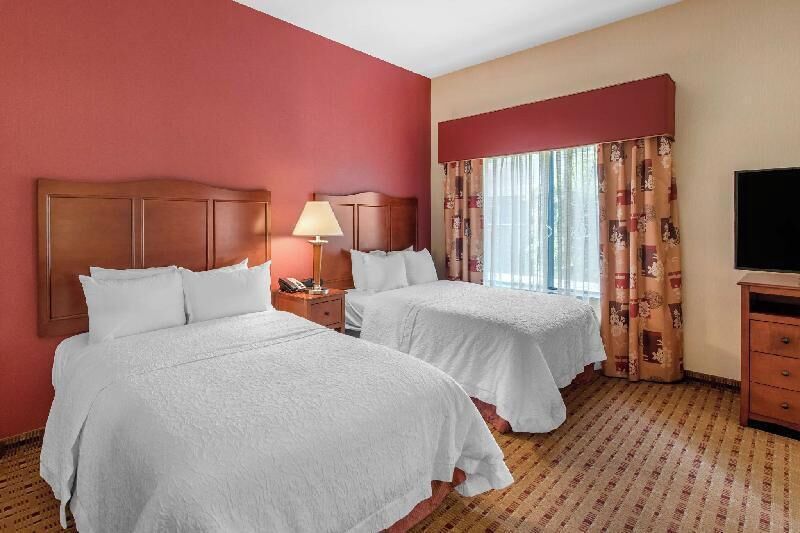 Premium bedding, down comforters, pillowtop beds, in-room safe