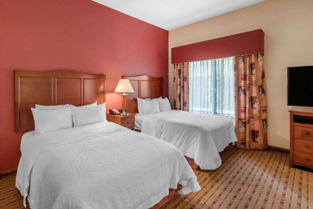 Premium bedding, down comforters, pillowtop beds, in-room safe