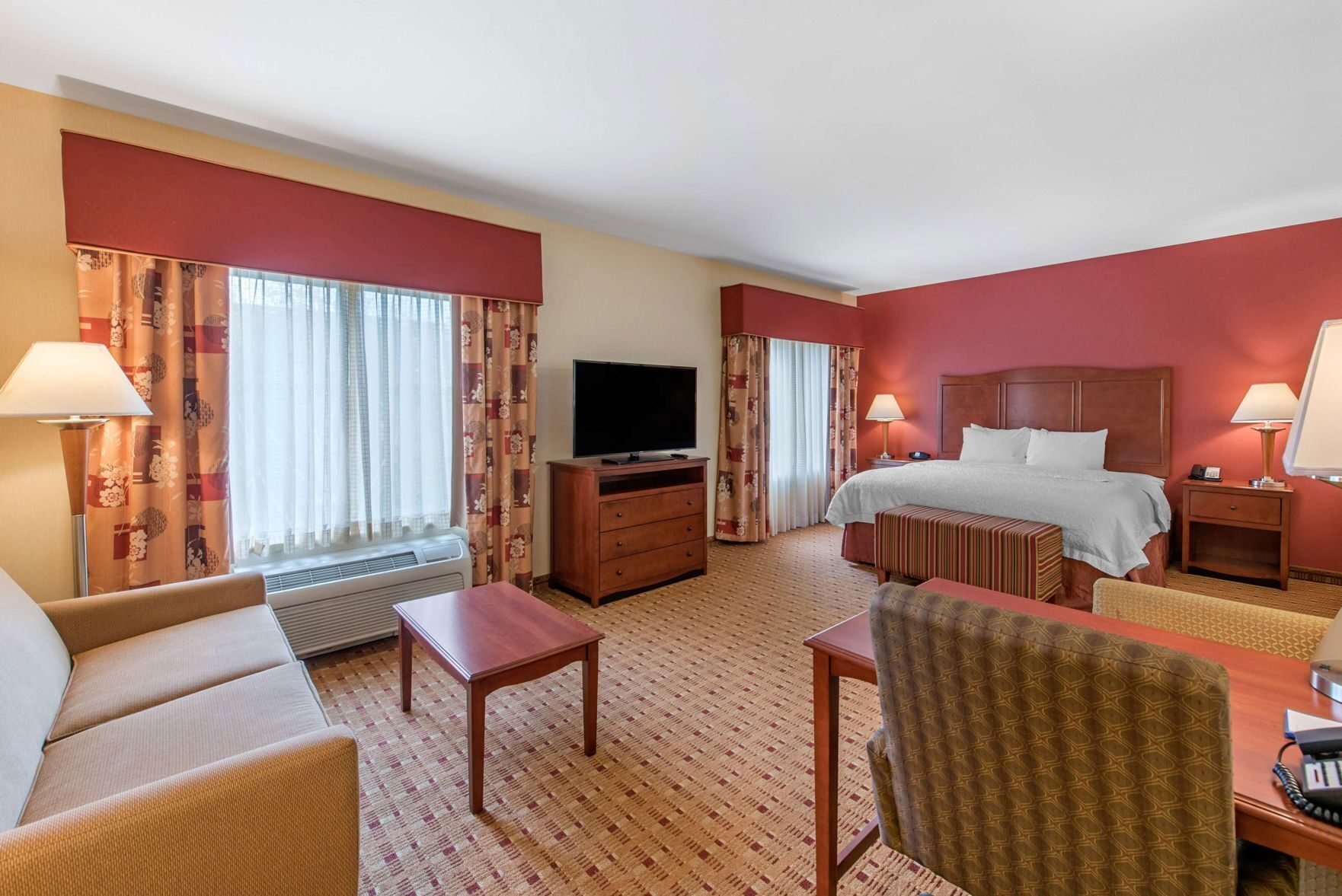 Premium bedding, down comforters, pillowtop beds, in-room safe