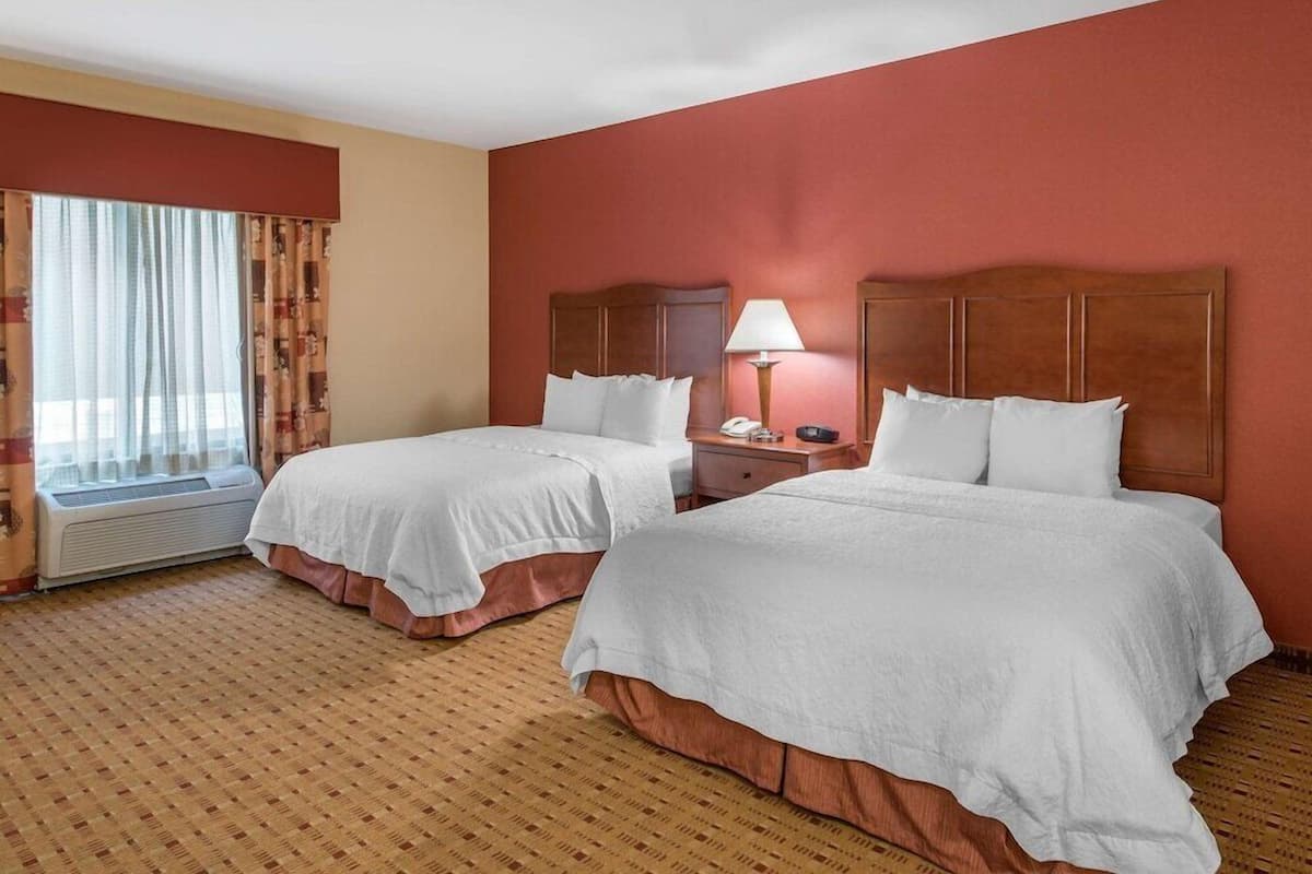 Premium bedding, down comforters, pillowtop beds, in-room safe