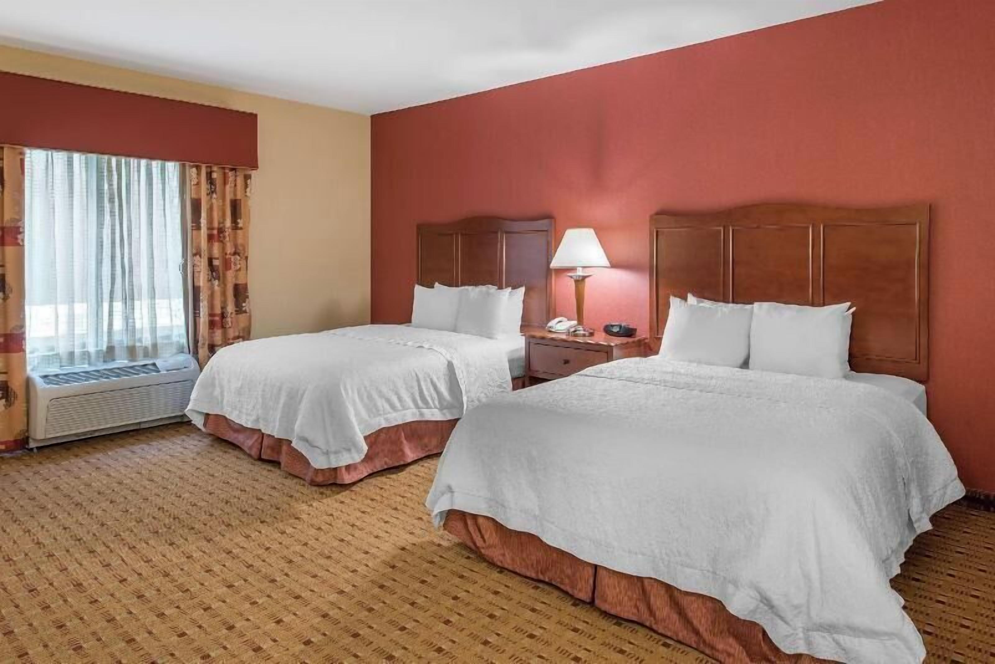 Premium bedding, down comforters, pillowtop beds, in-room safe