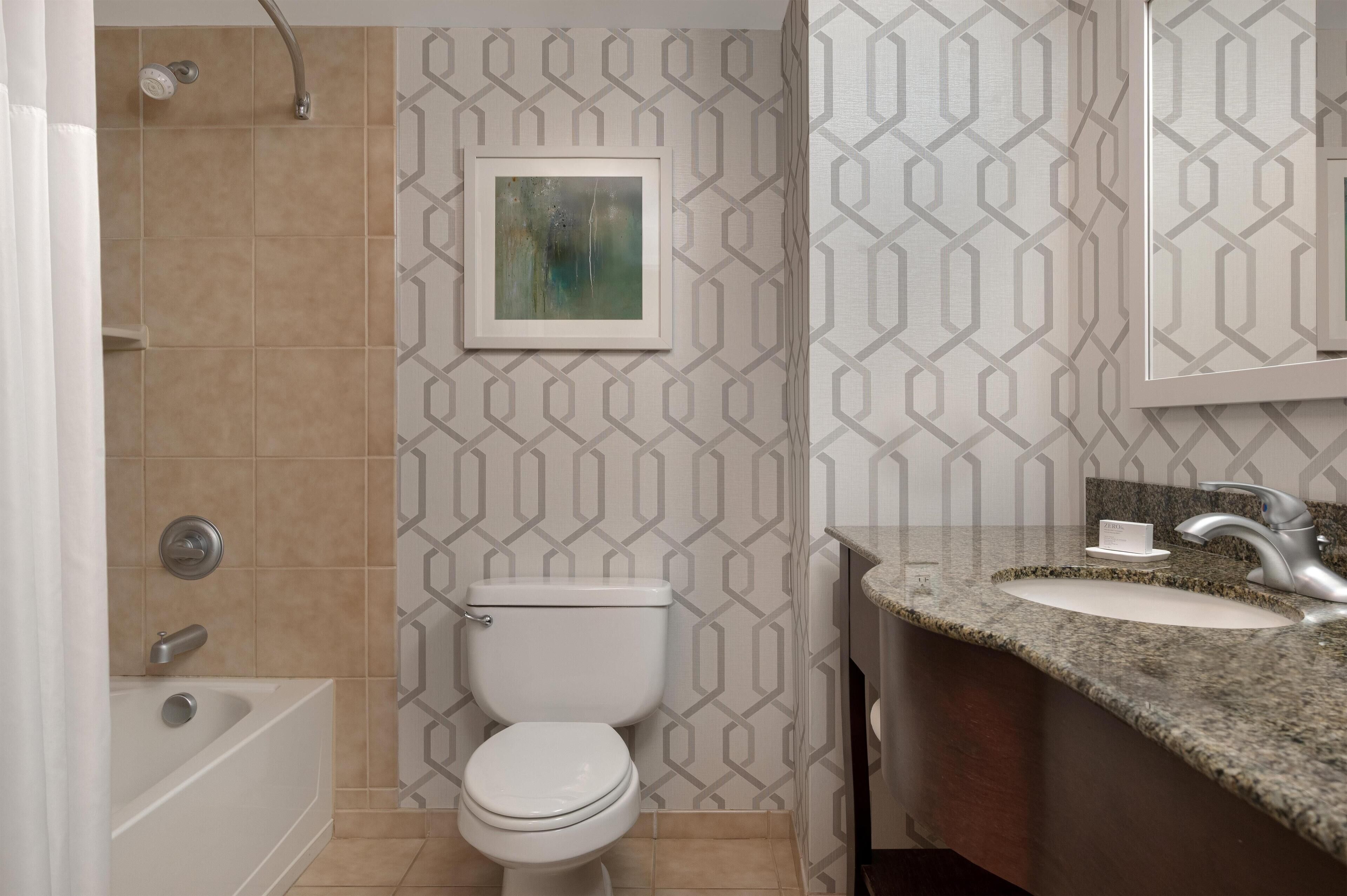 two queens | bathroom | free toiletries, hair dryer, towels