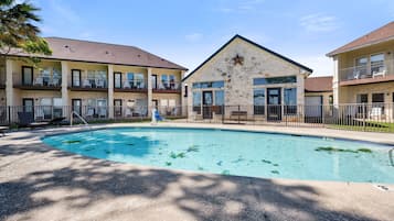 Seasonal outdoor pool, pool loungers
