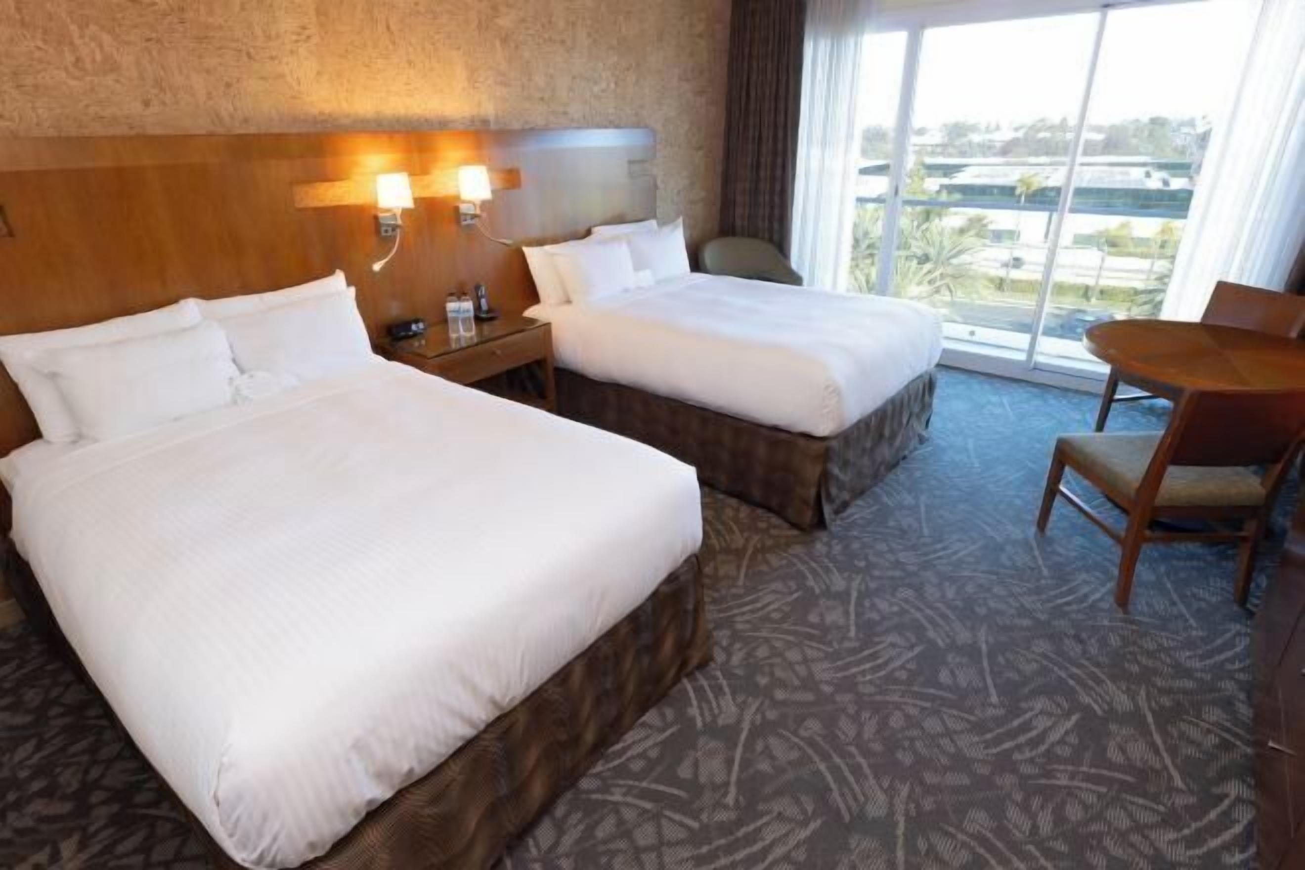 Premium bedding, down comforters, in-room safe, individually decorated