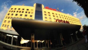 A hotel with a modern design, featuring a prominent 'hotel' sign on the facade. - Mir Hotel In Rovno (Rivne)