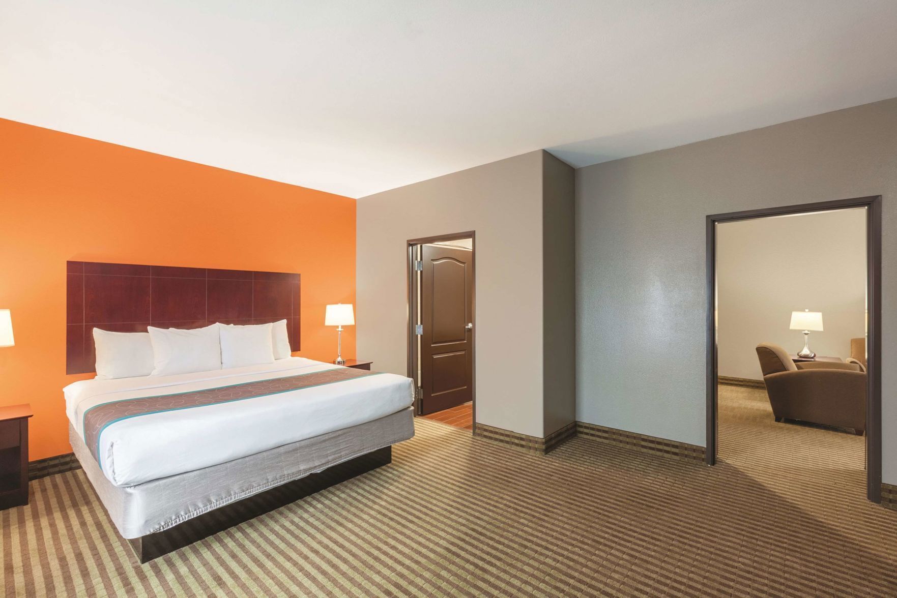 Premium bedding, desk, laptop workspace, iron/ironing board