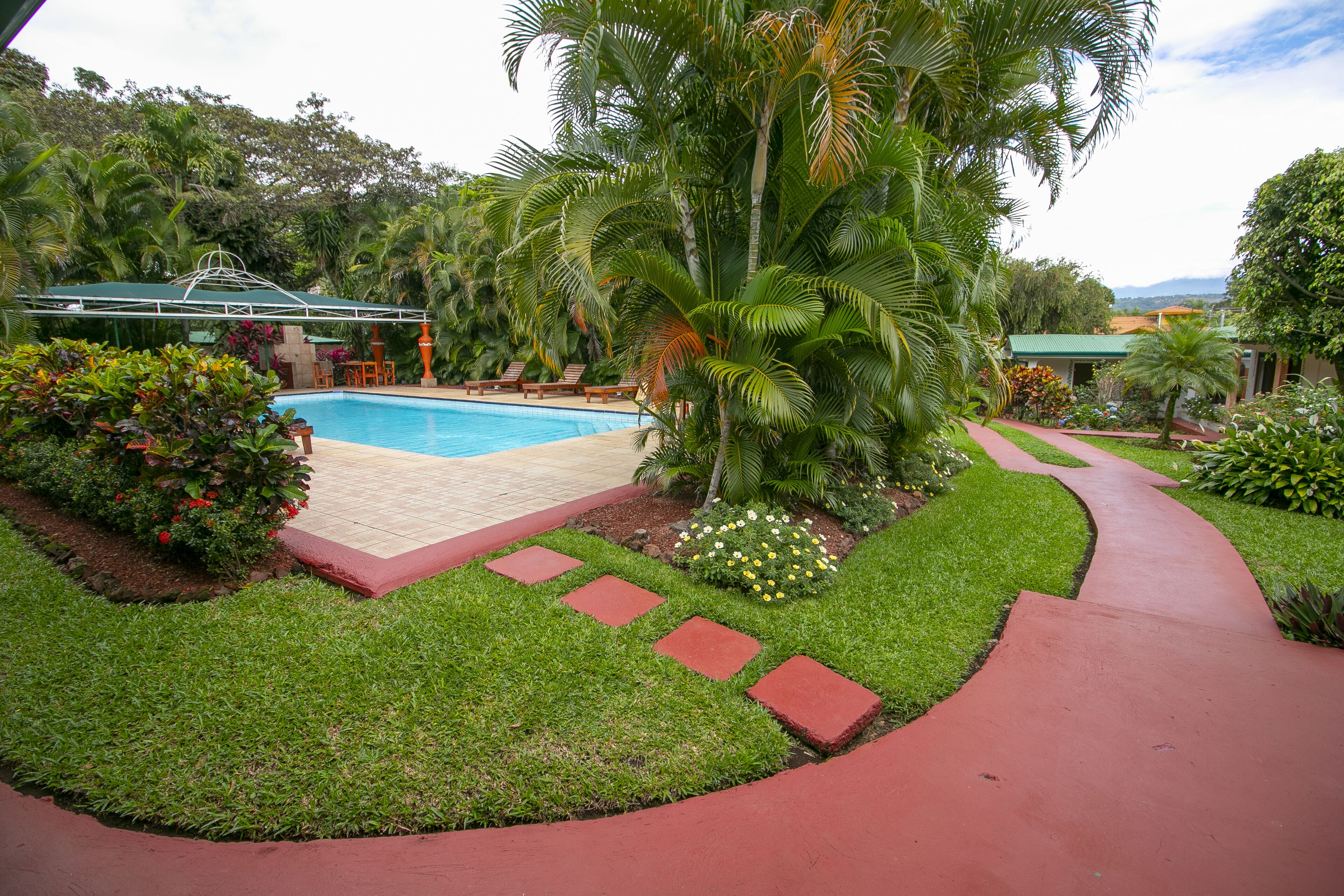 outdoor pool, pool loungers