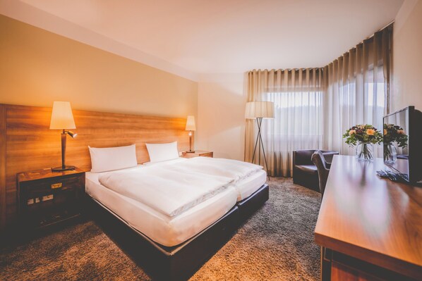 Deluxe Double Room | Hypo-allergenic bedding, down duvets, in-room safe, blackout curtains