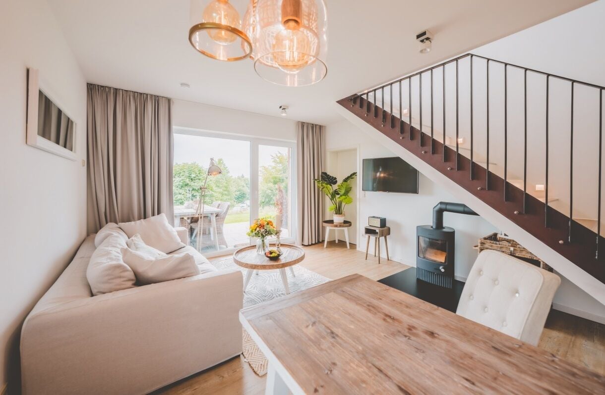 Chalet | Living area | 32-inch flat-screen TV with satellite channels, TV, table football