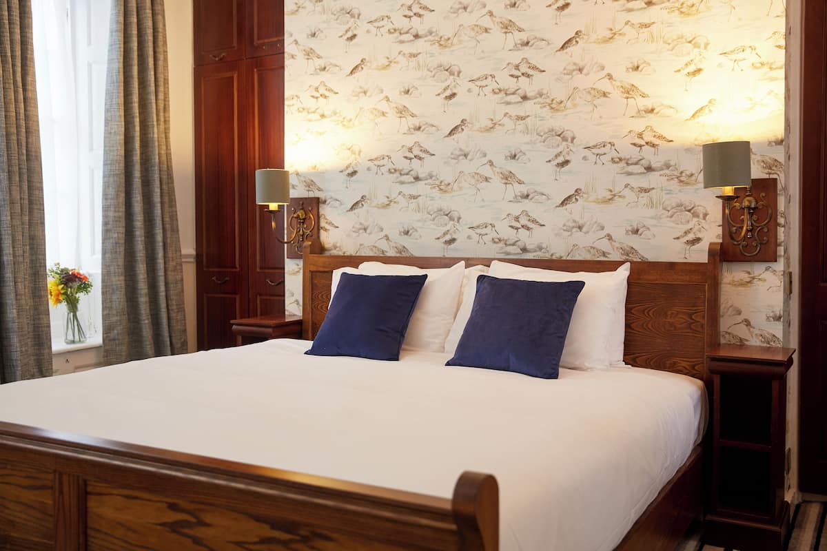 Superior tweepersoonskamer | Een bureau, een strijkplank/strijkijzer, gratis wifi