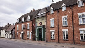 A traditional brick building with a sign reading "The Coleshill." - Coleshill Hotel by Greene King Inns (Birmingham)