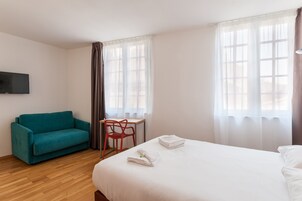 Studio, 2 persons, partial view on the port | Premium bedding, in-room safe, desk, iron/ironing board