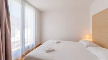 Apartment, 1 Bedroom, Terrace | Premium bedding, in-room safe, desk, iron/ironing board