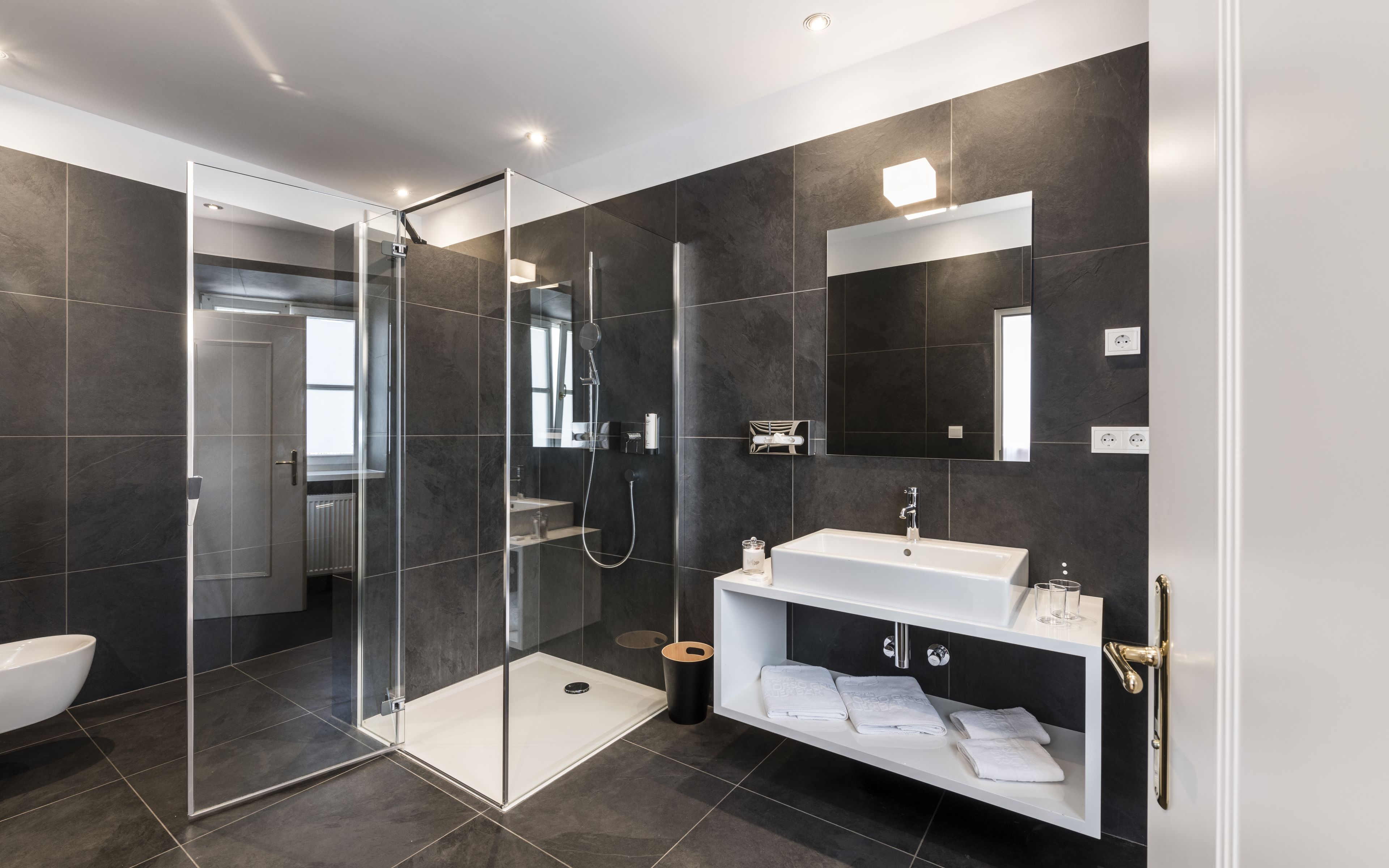 suite | bathroom | eco-friendly toiletries, hair dryer, bathrobes, slippers