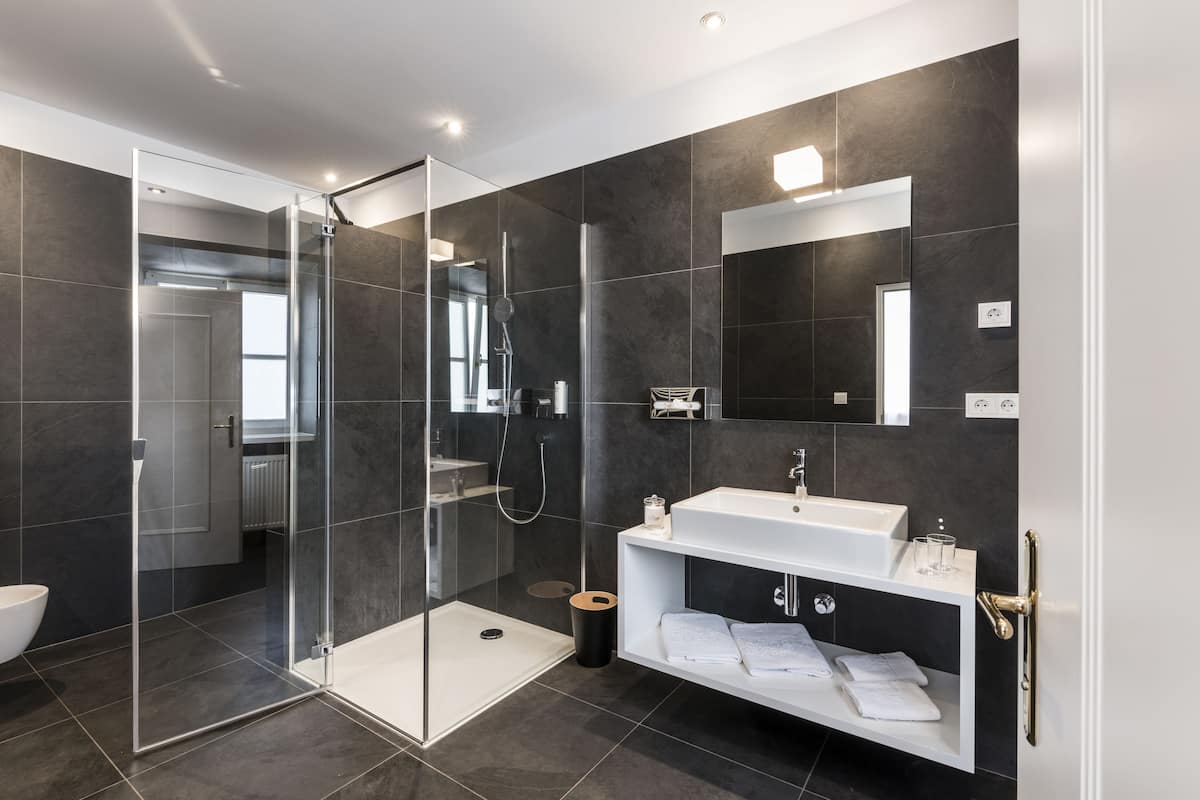 suite | bathroom | eco-friendly toiletries, hair dryer, bathrobes, slippers