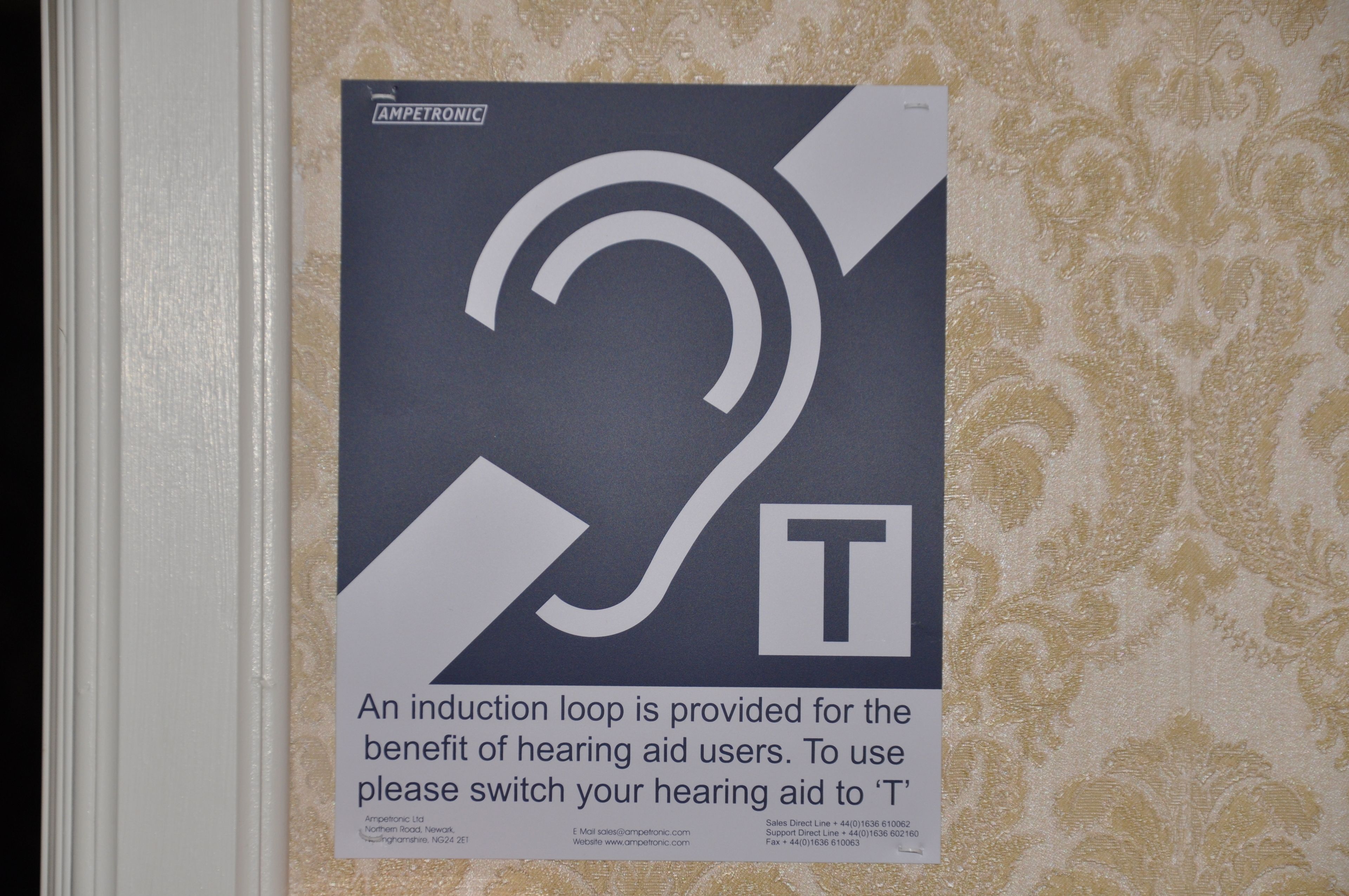 A notice about an induction loop for hearing aid users.