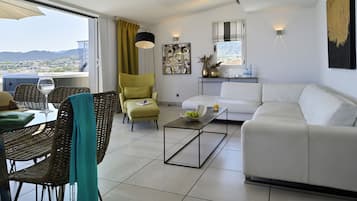 Suite | Living area | 80-cm LCD TV with satellite channels, TV