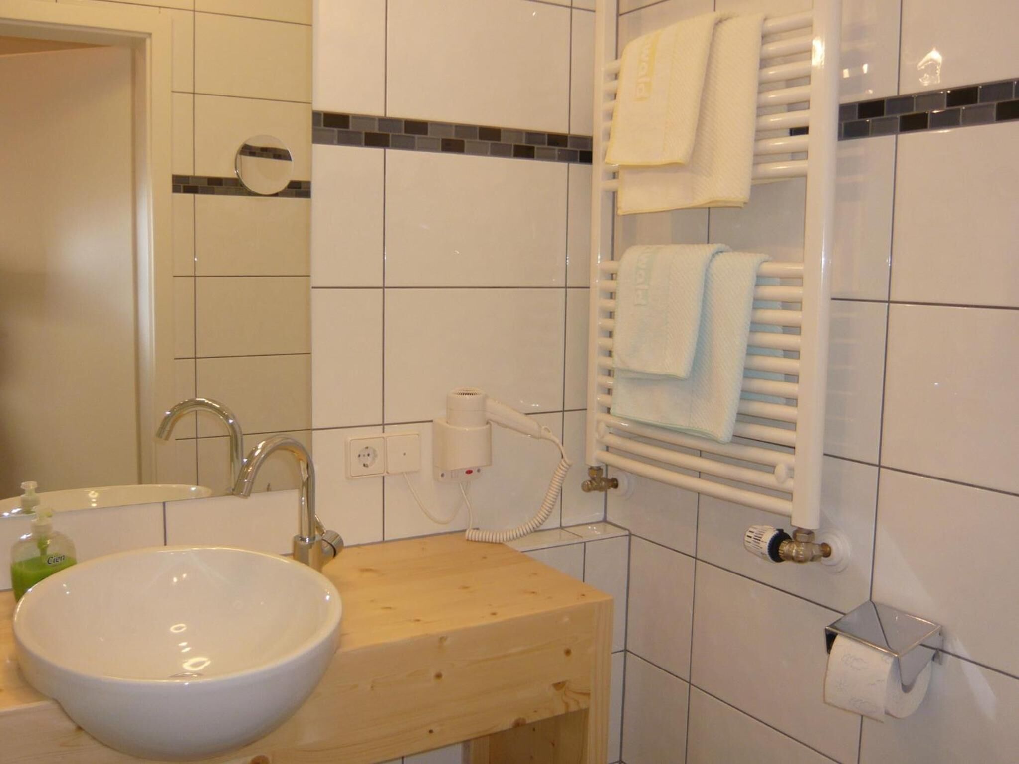 shower, eco-friendly toiletries, hair dryer, slippers