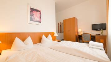 Hypo-allergenic bedding, minibar, in-room safe, desk