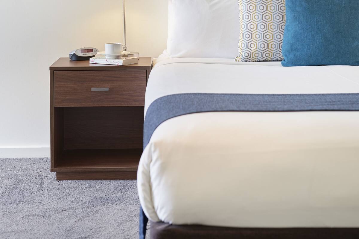 Minibar, desk, blackout drapes, iron/ironing board