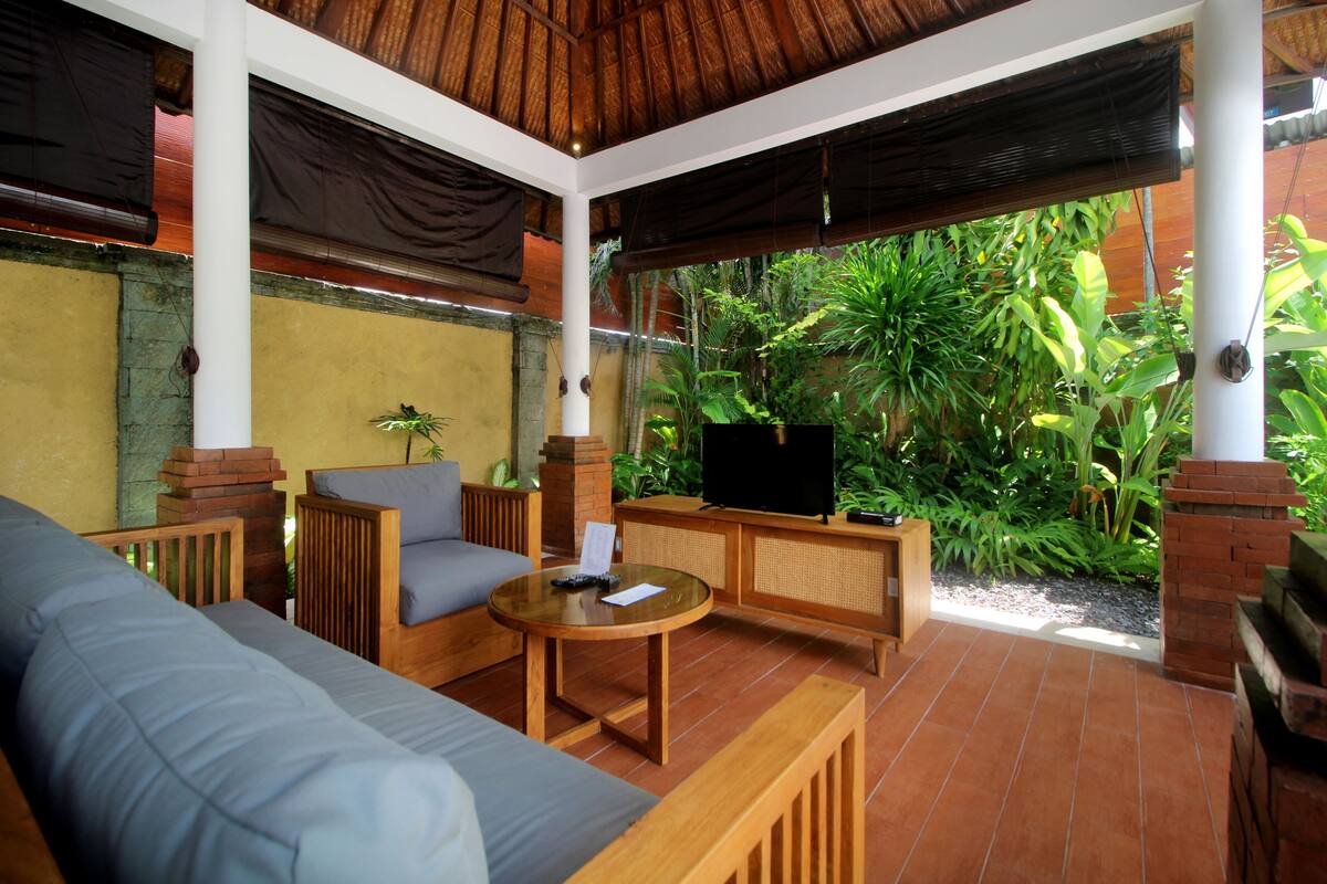 villa, 2 bedrooms | living area | 21-inch lcd tv with digital channels, tv, dvd player