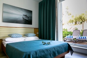 Enkeltrom – standard | Minibar, safe på rommet, skrivebord og barnesenger