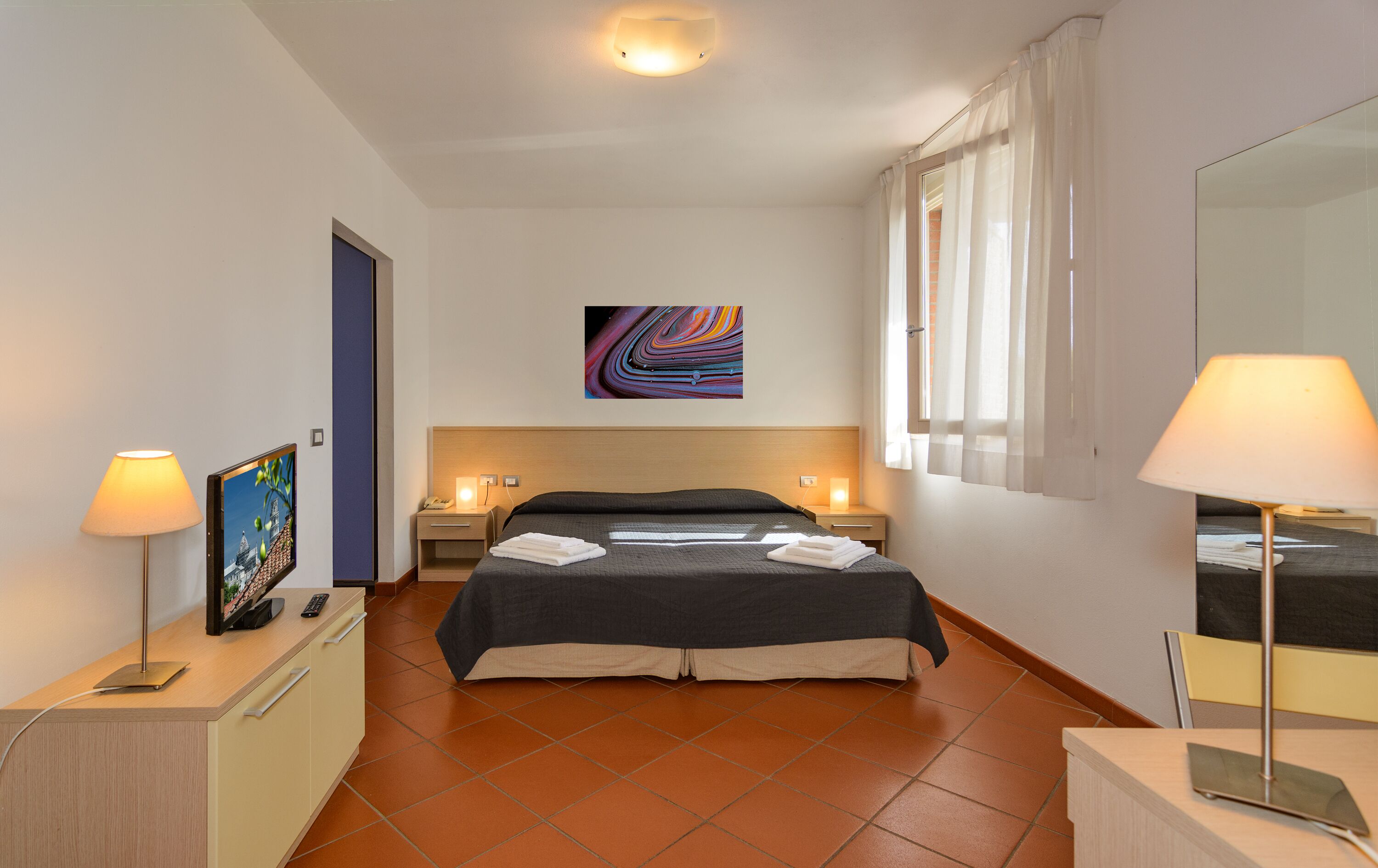 Departamento, 1 habitación (2 people) | Edredón, caja de seguridad en la habitación y muebles diferentes 