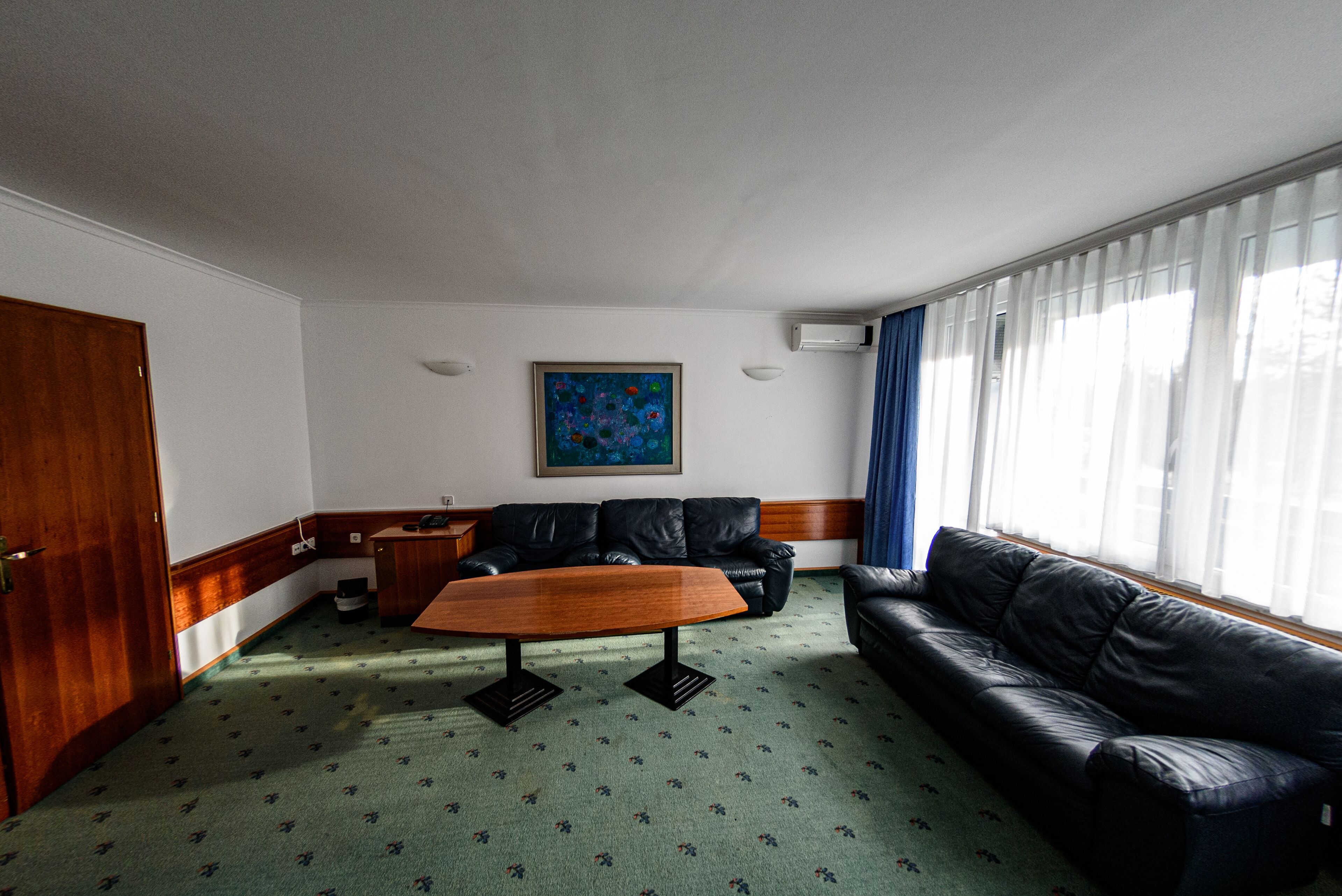 apartment, 1 bedroom, balcony | living area | 60-cm tv with satellite channels