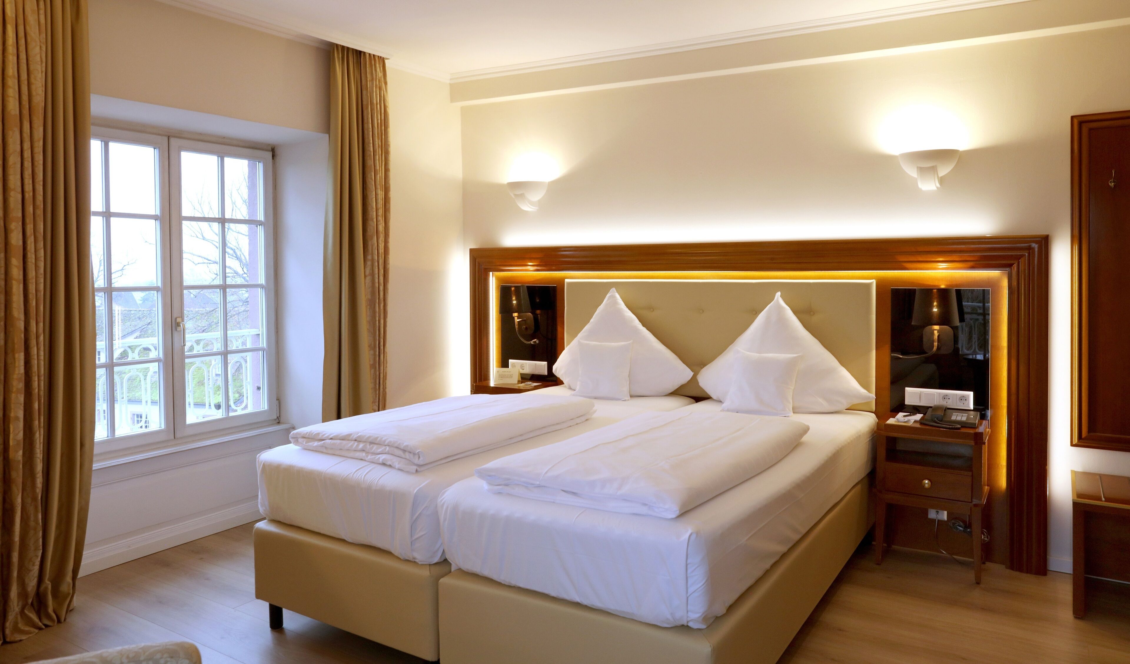 deluxe double room | select comfort beds, minibar, in-room safe, individually decorated
