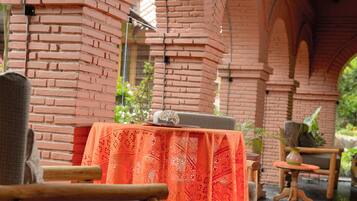 Dinner served, Peruvian cuisine, garden views