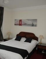 Desk, iron/ironing board, free cribs/infant beds, rollaway beds