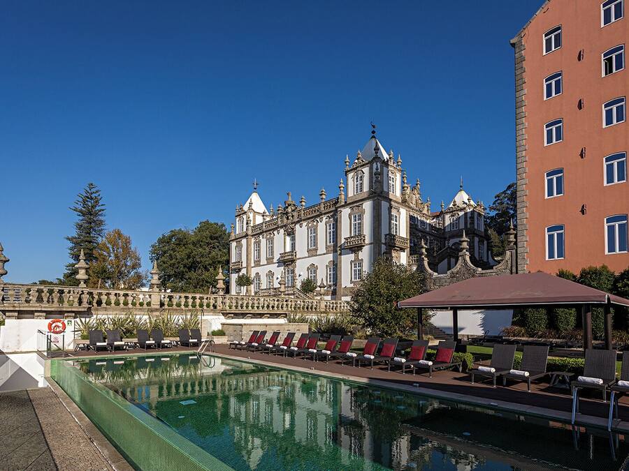 Indoor pool, outdoor pool, pool umbrellas, pool loungers