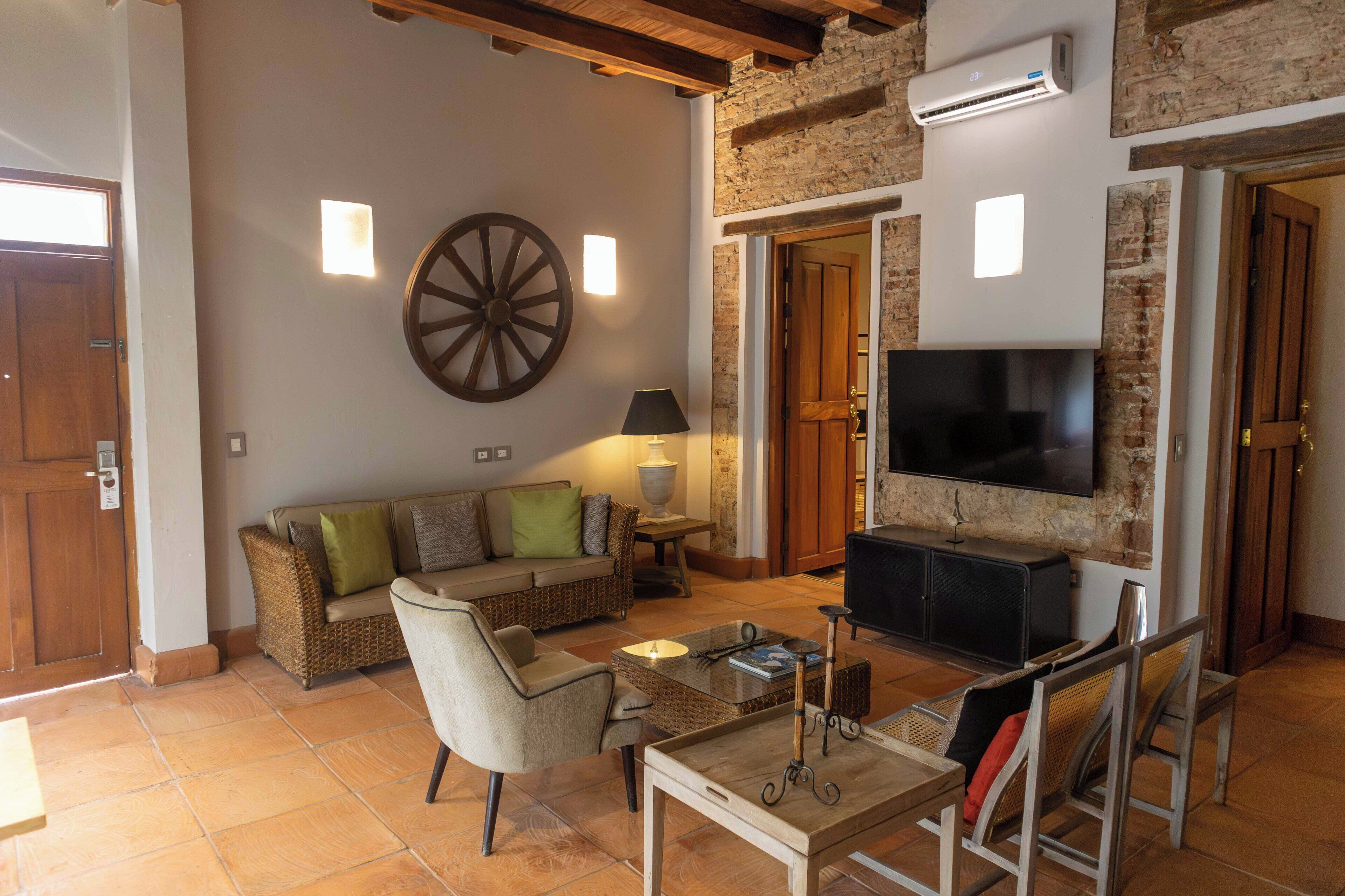 suite, 2 bedrooms, non smoking | living area | lcd tv