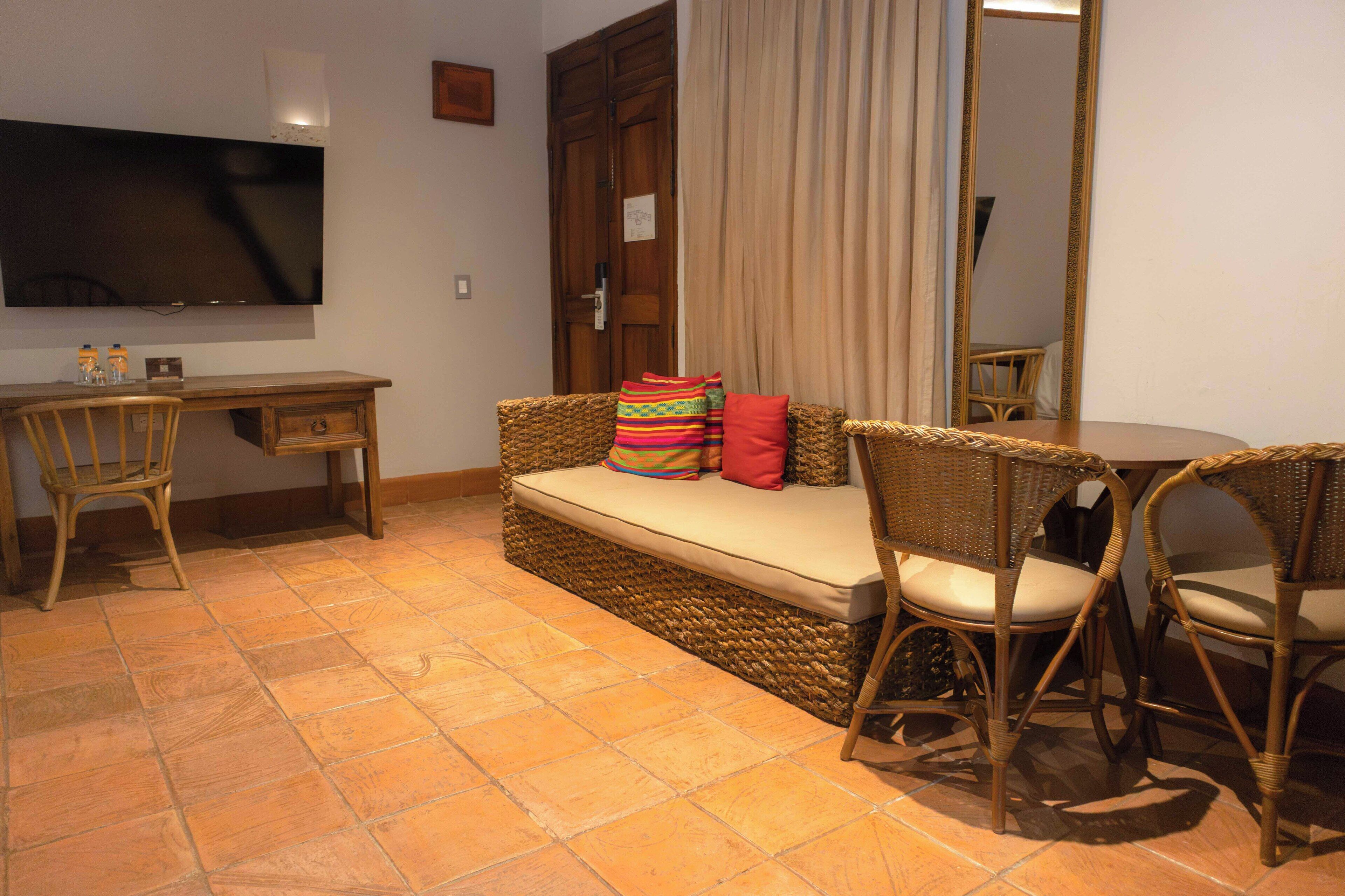 studio suite, 2 single beds, non smoking | living area | lcd tv