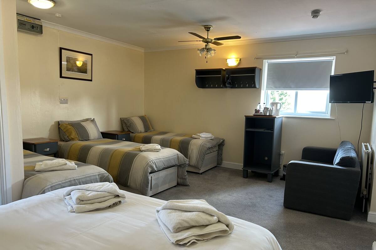 Superior Suite, Accessible, Ensuite | Desk, laptop workspace, blackout drapes, individually decorated