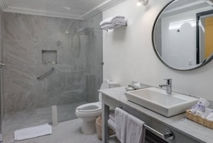 Family Room | Bathroom | Designer toiletries, hair dryer, towels