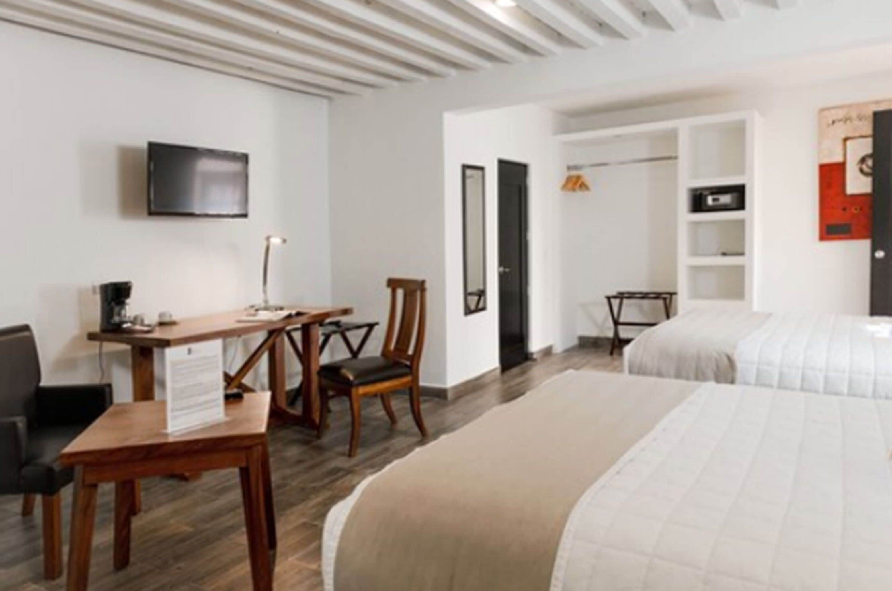 family room | 1 bedroom, premium bedding, free minibar items, in-room safe