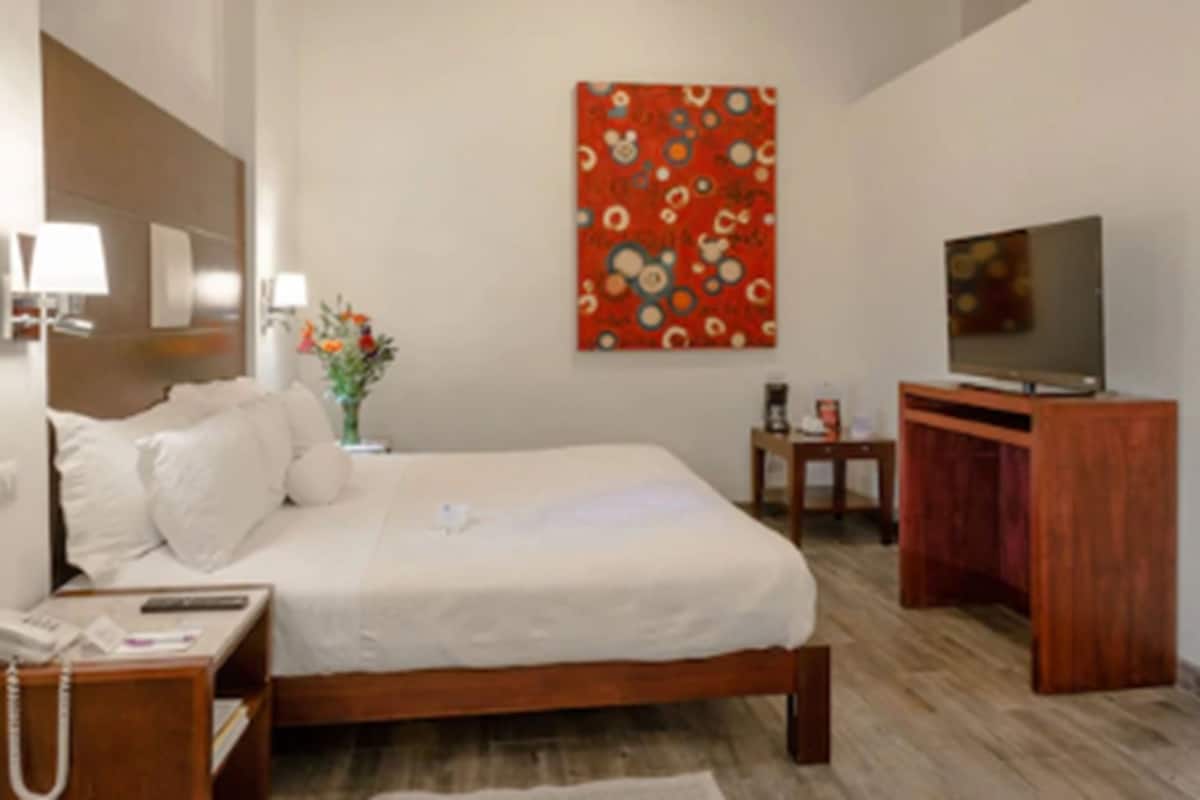 Suite, 1 King Bed, Patio | 1 bedroom, premium bedding, free minibar items, in-room safe